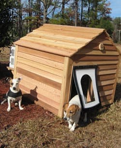 AIr conditioning unit on the back of a dog house